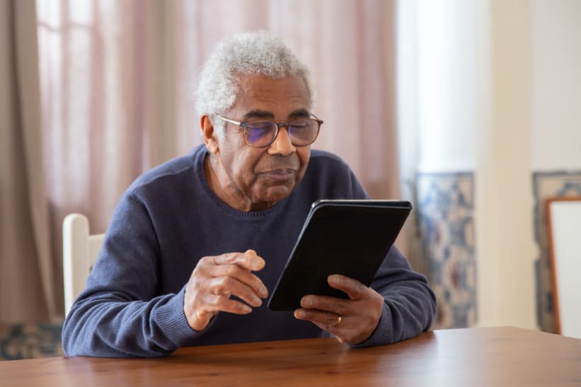 Image of man on tablet